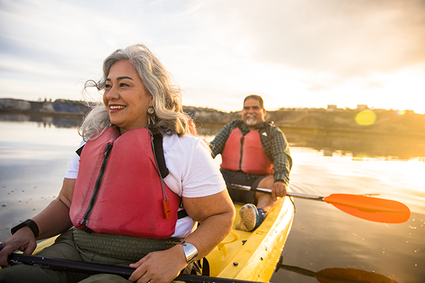 man and woman kayaking