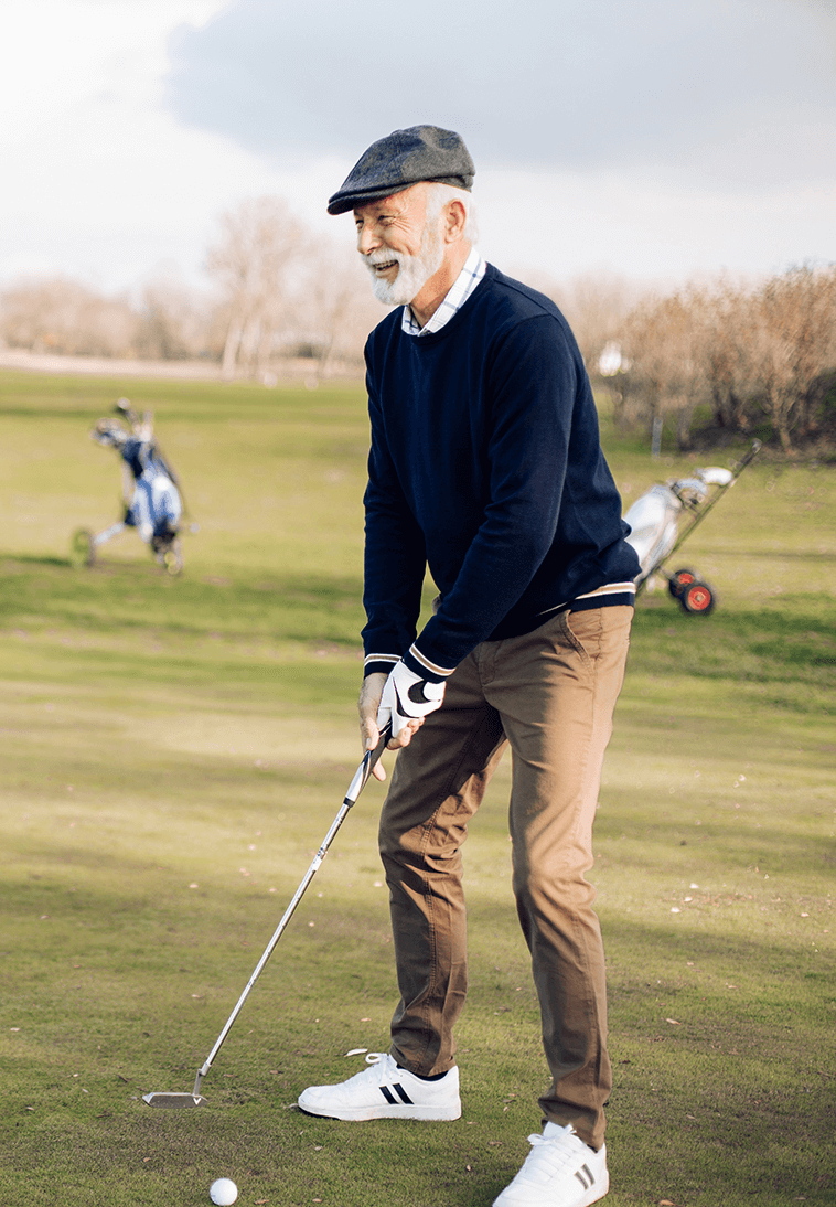 senior man golfing
